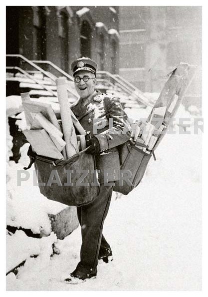 Mailman poses with his heavy load, Chicago, 1929 (P6440)